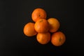 Pile of Six Clementine Oranges, From Above