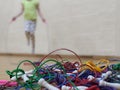 A pile of skipping jump ropes on the floor Royalty Free Stock Photo