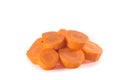 A pile of slices of fresh orange carrot isolated on white background