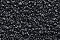 Pile of small black stones as a background texture composition, top view
