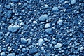 Pile of small gravel stones in navy blue tone. Royalty Free Stock Photo