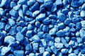 Pile of small gravel stones in navy blue tone. Royalty Free Stock Photo