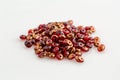 Pile of small oval red/gold beads that are used to create jewel Royalty Free Stock Photo