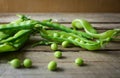 Pile of snow peas on wood background Royalty Free Stock Photo