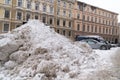 Pile snow with removed of after heavy snowfall on a city street Royalty Free Stock Photo