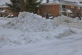 A pile of snow with removed beside of snow after a very heavy snowfall Royalty Free Stock Photo