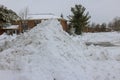 A pile of snow with removed beside of snow after a very heavy snowfall