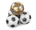 Pile of soccer balls, one golden ball on top - lieadership concept Royalty Free Stock Photo