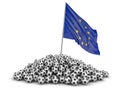 Pile of Soccer footballs and Europian Union flag