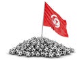 Pile of Soccer footballs and Tunisian flag