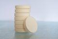 Pile of soluble tablets on glass table top Royalty Free Stock Photo