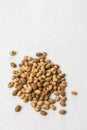 Pile of soya beans isolated above white marble background with copy space Royalty Free Stock Photo
