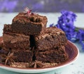 Pile of square baked pieces of chocolate Brownie cake