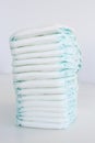 Pile or stack of baby diapers