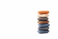 A pile, stack, tower of spa stones, simple treatment zen scene abstract symbol, copy space background. Rubber like zen pebbles Royalty Free Stock Photo