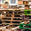 Pile or Stack of Used Empty Wooden Transport Pallets