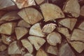 Pile of stacked firewood in rural garden ready for winter. Preparation for the winter. Wooden log abstract background Royalty Free Stock Photo
