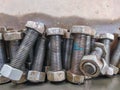 pile of stainless steel bolts and nuts