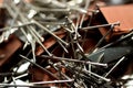 Pile of stapler staples and nickel-plated steel pins Royalty Free Stock Photo