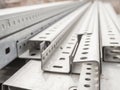 Pile steel channel for construction of a house to an outdoor site. Steel beams for the roof. Profile pipes Royalty Free Stock Photo