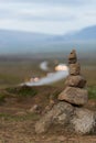 A pile of stones in an icelandic landscape