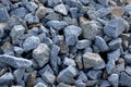 A pile of stones in a landfill for use on a construction site or in garden architecture for mulching, walls and gabions. Fine grav Royalty Free Stock Photo