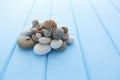 Pile of stones and a large sea shell Royalty Free Stock Photo