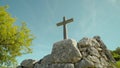 Pile of stones with lithic cross monument in national park