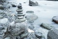 Pile and stones perfectly balanced on the shore of a river Royalty Free Stock Photo