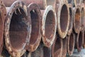 A pile of stored dredging pipes close up with selective focus Royalty Free Stock Photo