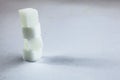 Pile of Sugar Cubes Stacking on Isolated White Background with Harsh Shadow, which can be used to imply dark side of Sugar. Royalty Free Stock Photo