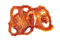 Pile of sundried or dried tomato halves, top view. Clipping paths, shadow separated Royalty Free Stock Photo