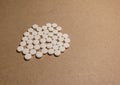 A pile of tablets on cardboard paper Royalty Free Stock Photo