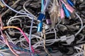 Pile of tangled wires used cables electronic waste