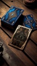 A pile of tarot cards lie scattered and spread across a table top surrounded by multiple occult items. Royalty Free Stock Photo