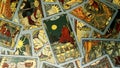 A pile of tarot trump cards jumbled, scattered and haphazardly arranged. Royalty Free Stock Photo