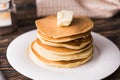 Pile of tasty pancakes with butter. Breakfast concept. Royalty Free Stock Photo