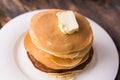 Pile of tasty pancakes with butter. Breakfast concept. Royalty Free Stock Photo