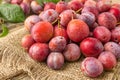 Pile of tasty ripe plums on table, closeup Royalty Free Stock Photo