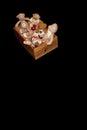 Pile of teddy bears in a wooden box