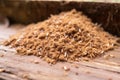 a pile of termite frass droppings on wood Royalty Free Stock Photo