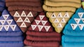 Pile of Thai style triangular pillows