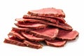 Pile of thinly sliced pastrami meat isolated on a white background Royalty Free Stock Photo