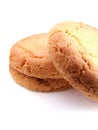 Pile of three ginger nut biscuits one at the side Royalty Free Stock Photo