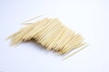 A pile of toothpicks on a white background