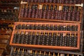 Pile of traditional retro Chinese wooden abacus close-up