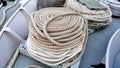 The pile of tros ropes that are on the deck of the ship that the ship uses when docking at the dock Royalty Free Stock Photo