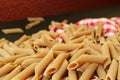 Pile of Dried Whole Wheat Penne Rigate Pasta Royalty Free Stock Photo