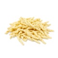 Pile of uncooked trofie pasta isolated on white