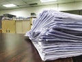 Pile of unfinished documents on the office desk, Stack of business paper